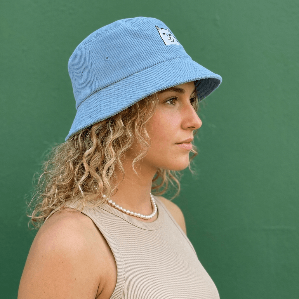 profile side shot, medium close up of wearing @Drewe Bucket Hat