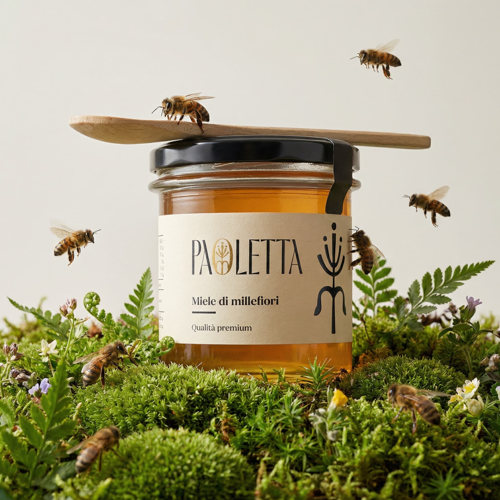 The image is a conceptual, nature-infused product still life with a poetic, slightly surreal tone.
A slim glass fragrance vial stands upright in a miniature natural landscape of moss and small plants, as if emerging organically from the ground. Several bees hover and perch around the bottle—one resting on the cap, others mid-flight—introducing motion, life, and a sense of ecological interaction.
The background is a clean, pale neutral, creating strong negative space and isolating the scene so it feels staged yet quiet. This contrast heightens the surreal quality: a controlled studio environment hosting a moment that feels borrowed from nature.
Lighting is soft and naturalistic, with gentle highlights on the glass and subtle shadows in the moss. The textures—smooth vial, soft greenery, delicate insects—are clearly articulated without drama.
Overall, the image feels thoughtful, restrained, and symbolic, blending product design with environmental storytelling. It suggests scent as something alive and instinctive, communicated through mood and metaphor rather than overt branding or luxury cues.